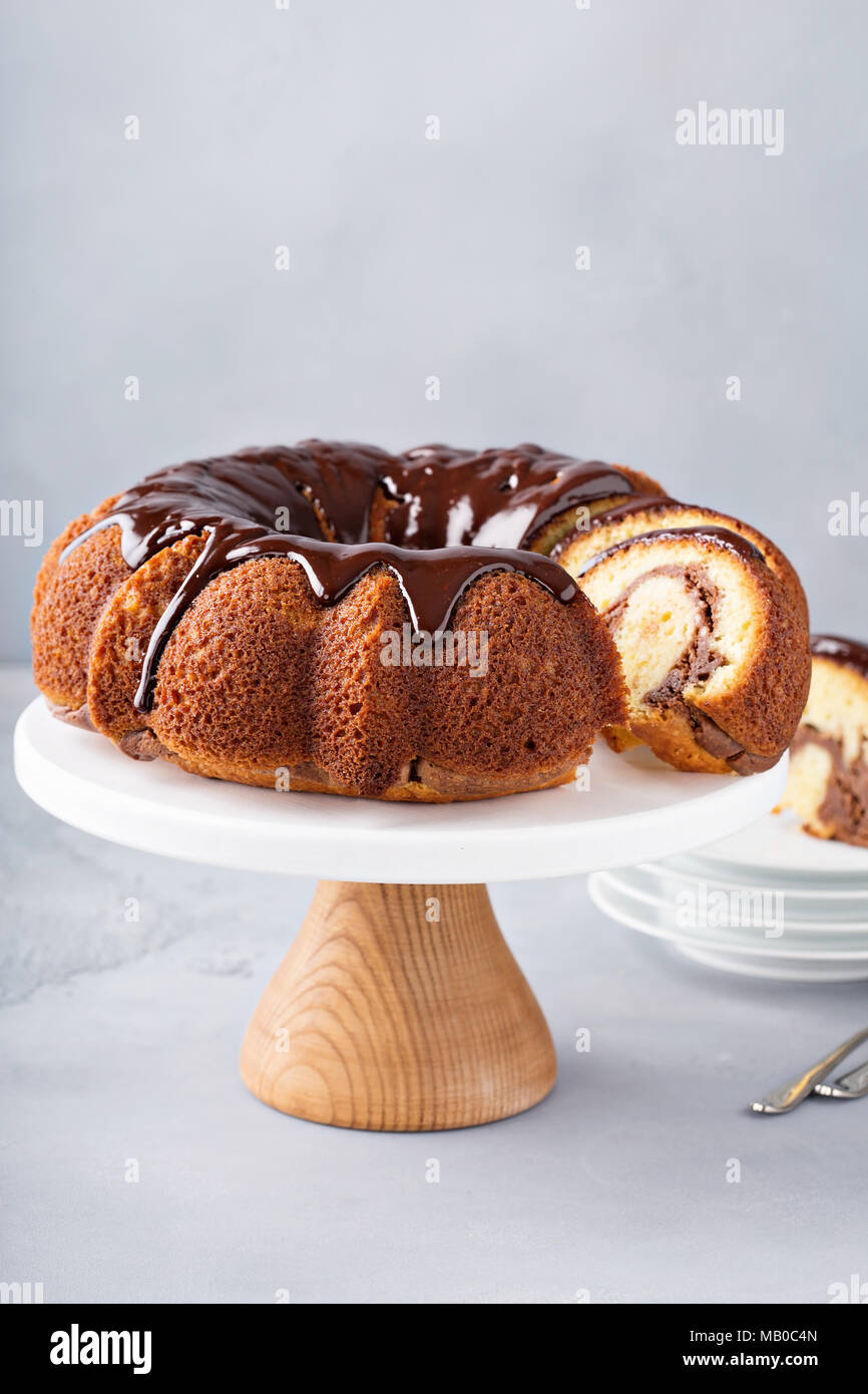 Vanilla bundt cake with chocolate cheesecake filling Stock Photo Alamy