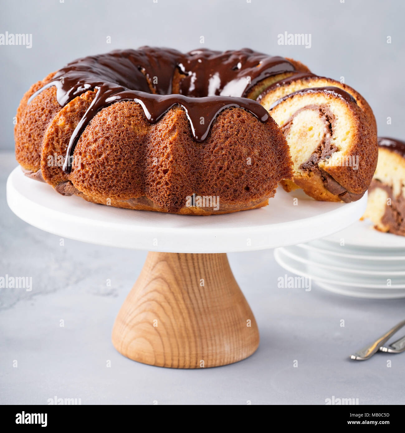 Vanilla bundt cake with chocolate cheesecake filling Stock Photo Alamy