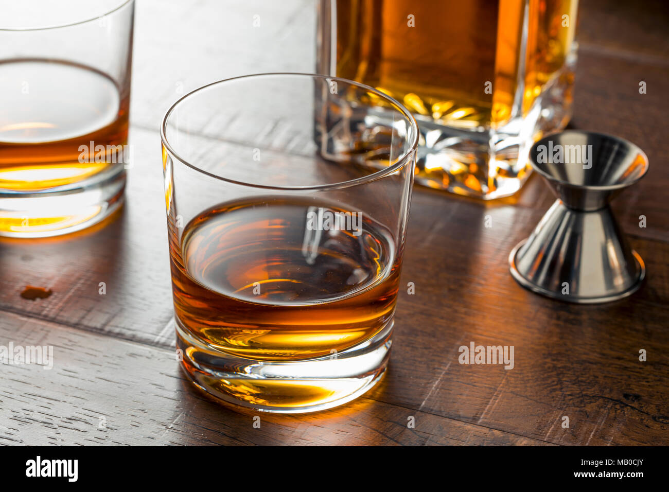 Delicious Bourbon Whiskey Neat in a Glass Stock Photo