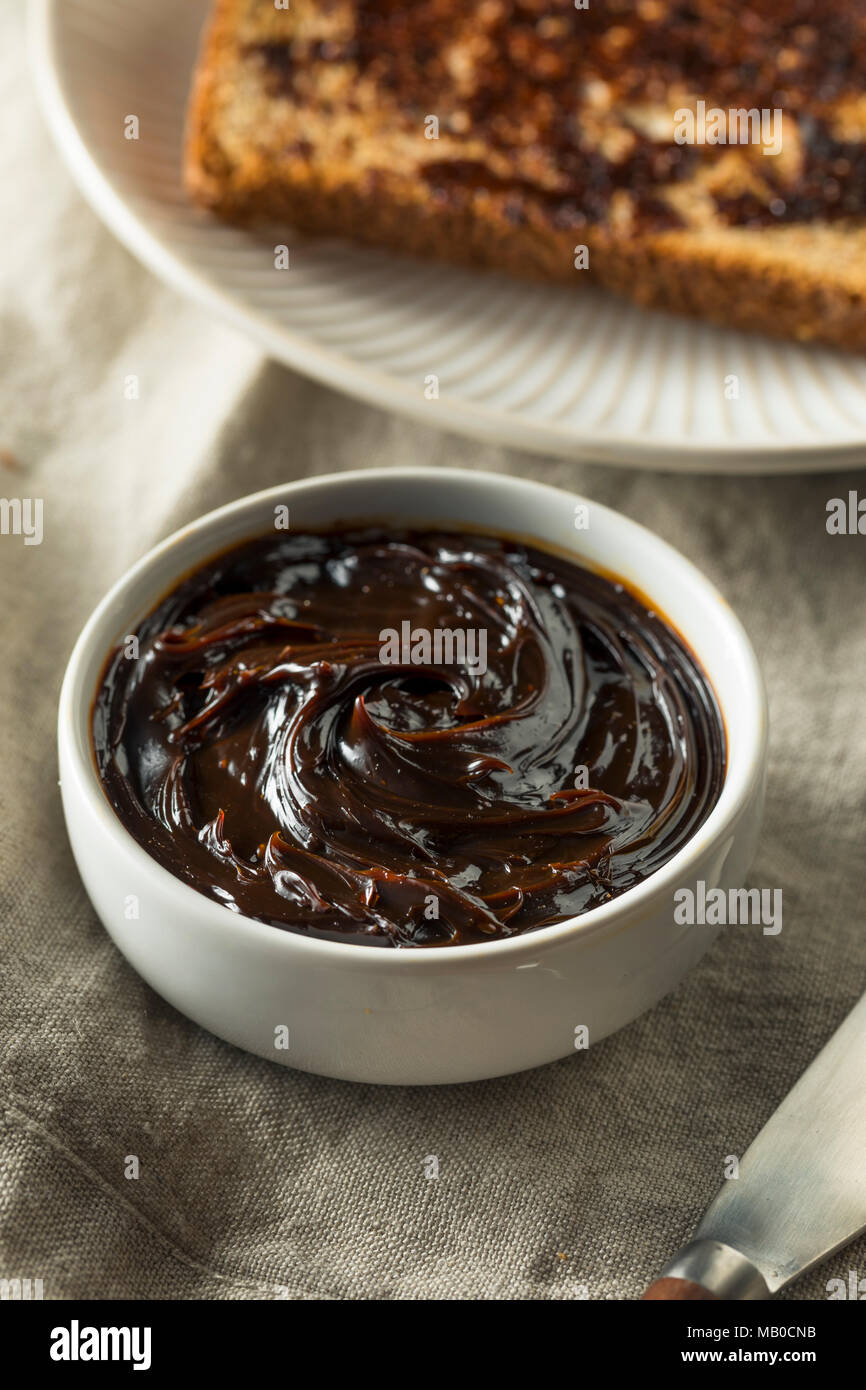 Delicious Australian Dark Yeast Extract Spread for Toast Stock Photo