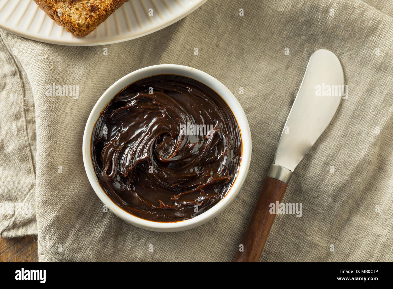 Delicious Australian Dark Yeast Extract Spread for Toast Stock Photo