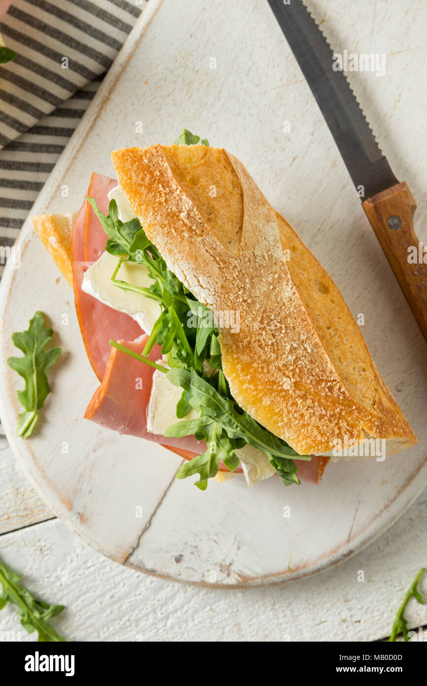 Homemade French Ham and Brie Baguette Sandwich with Arugula Stock Photo
