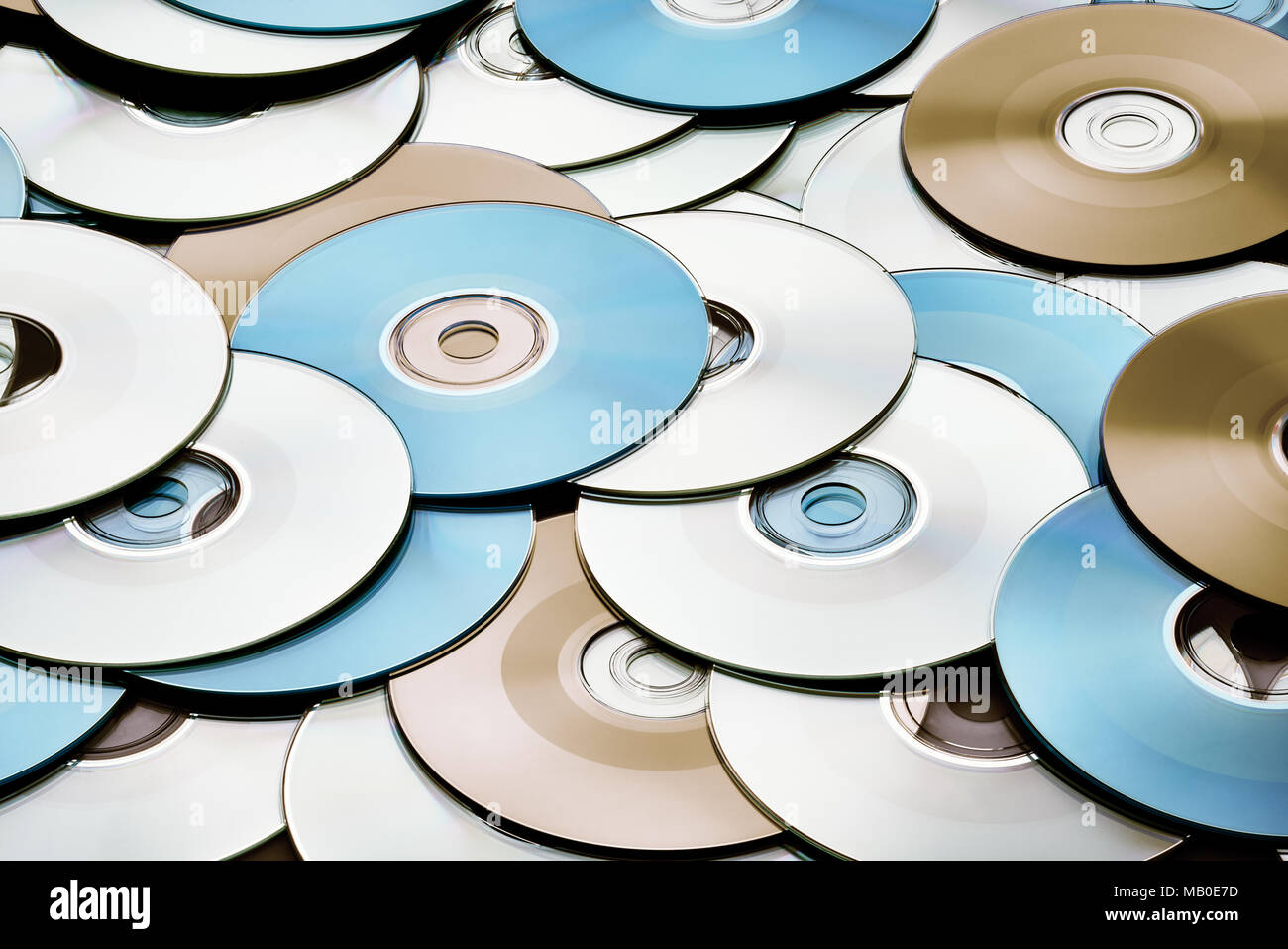 Random abstract DVD and CD disks create data concept background Stock Photo