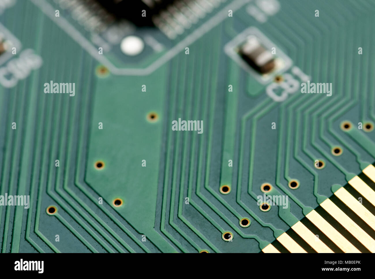 Details of a digital electronic circuit board with electric tracks and