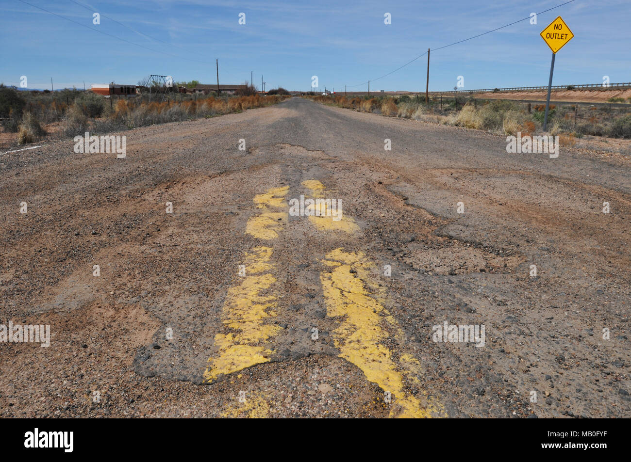 A crumbling, dead end stretch of old Route 66 is pictured near Joseph City, Arizona. Stock Photo