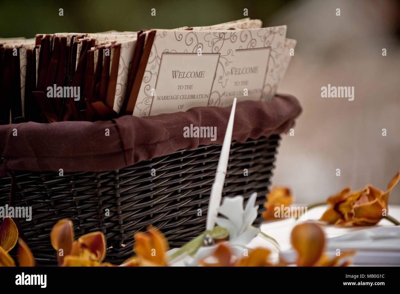 Close Up View Of A Basket Of Wedding Program Cards Outdoor Stock