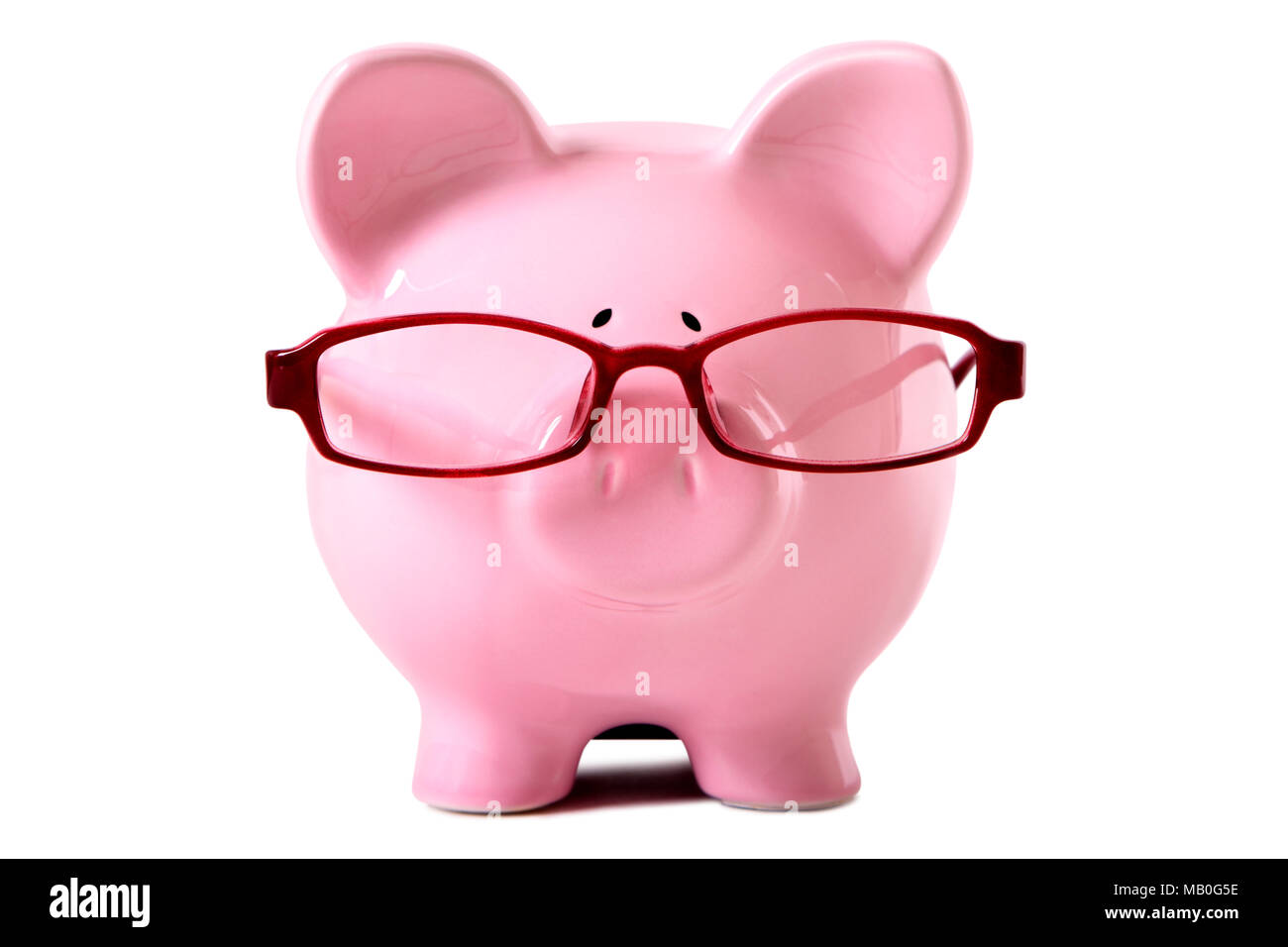 Pink piggy bank wearing glasses. Isolated on white Stock Photo - Alamy