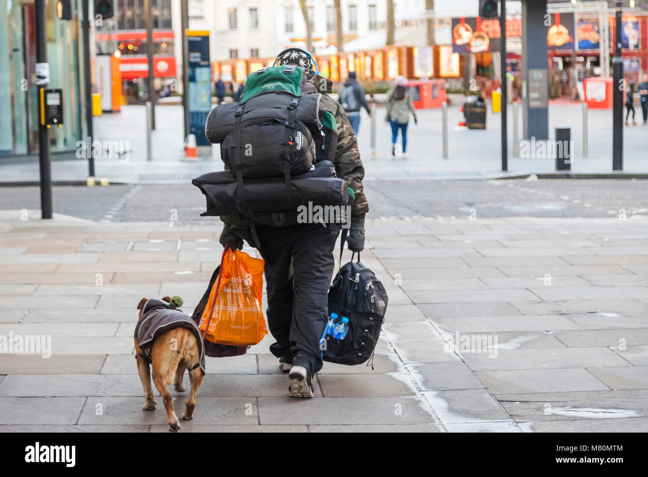 England, London, Soho, Leicester Square, Homeless Man with Dog Stock Photo