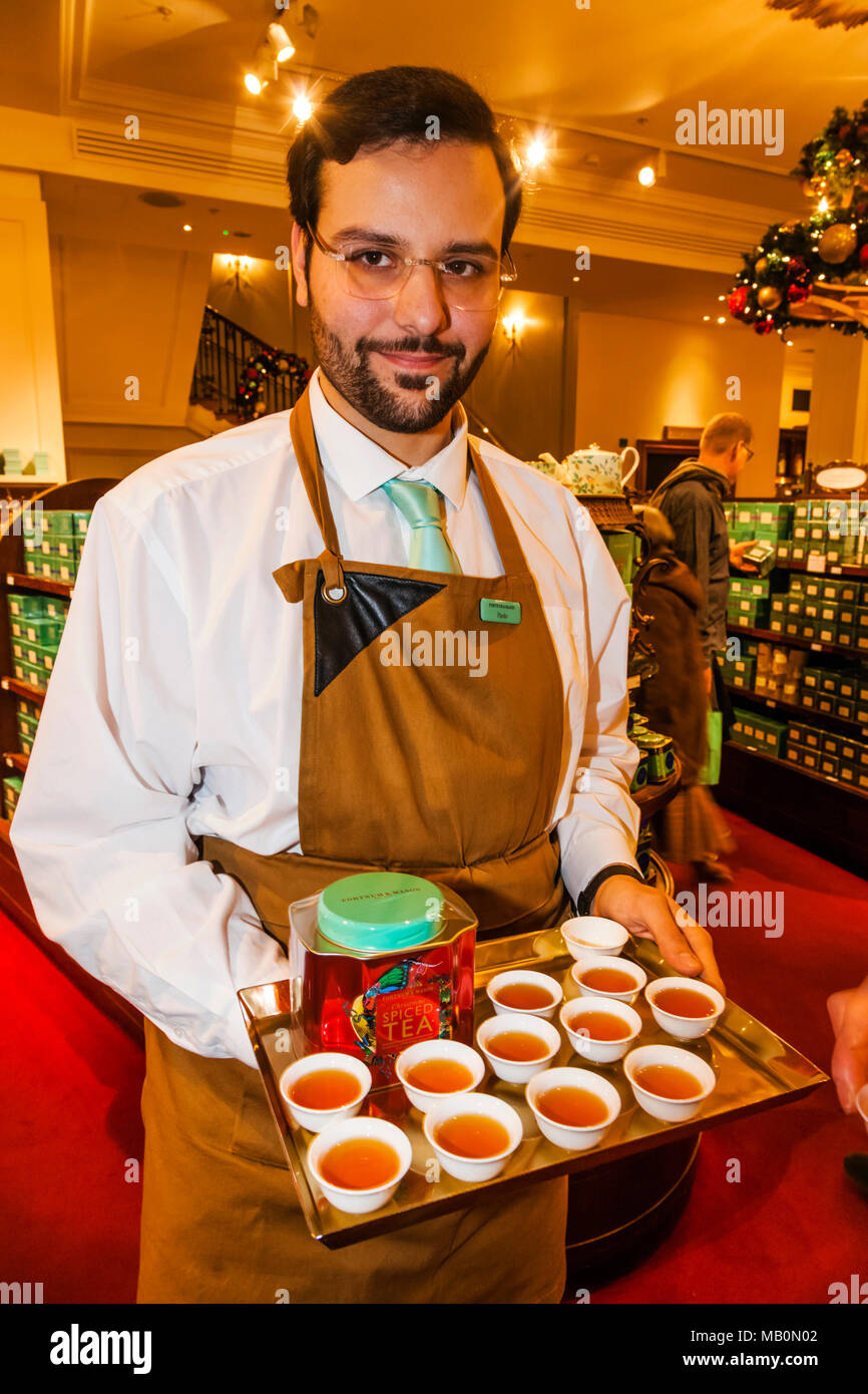 England, London, Piccadilly, Fortnum & Mason Store, Sales Assistant Offering Free Tea Samples