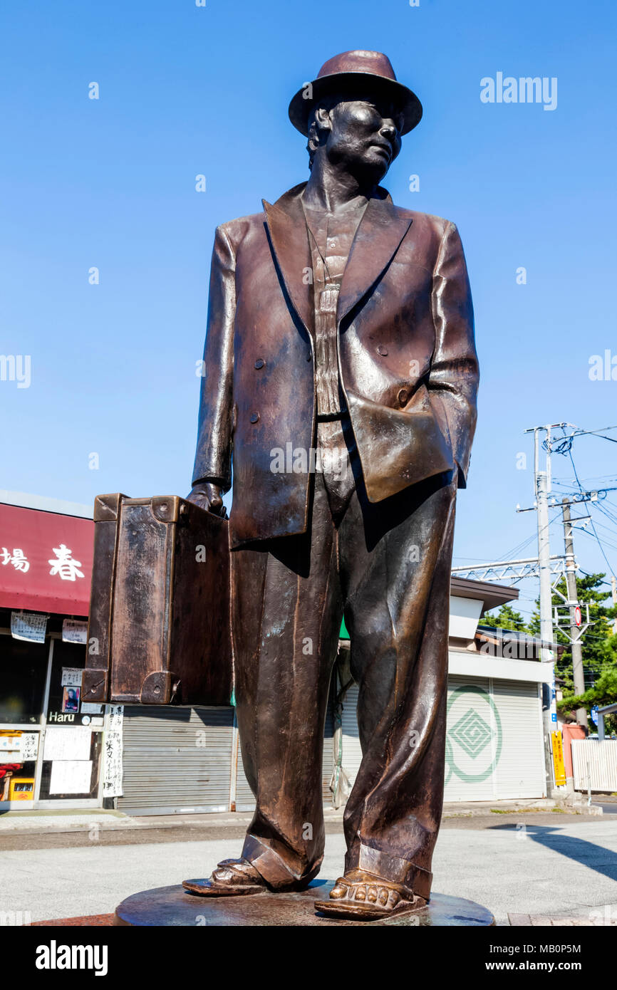 Japan, Hoshu, Tokyo, Katsushika Shibamata, Statue of the Actor Kiyoshi Atsumi aka Tora-san Stock Photo