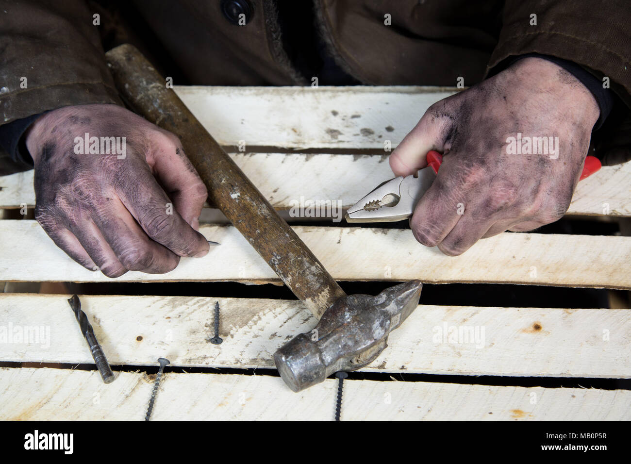 Heavy low-paid work for little money. Stock Photo