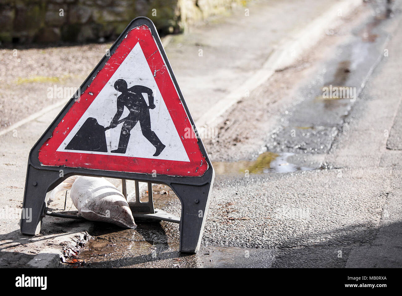 Roadworks signage related to health and safety regulations, viewed here in Acton Burnell, Shrewsbury, England. Stock Photo