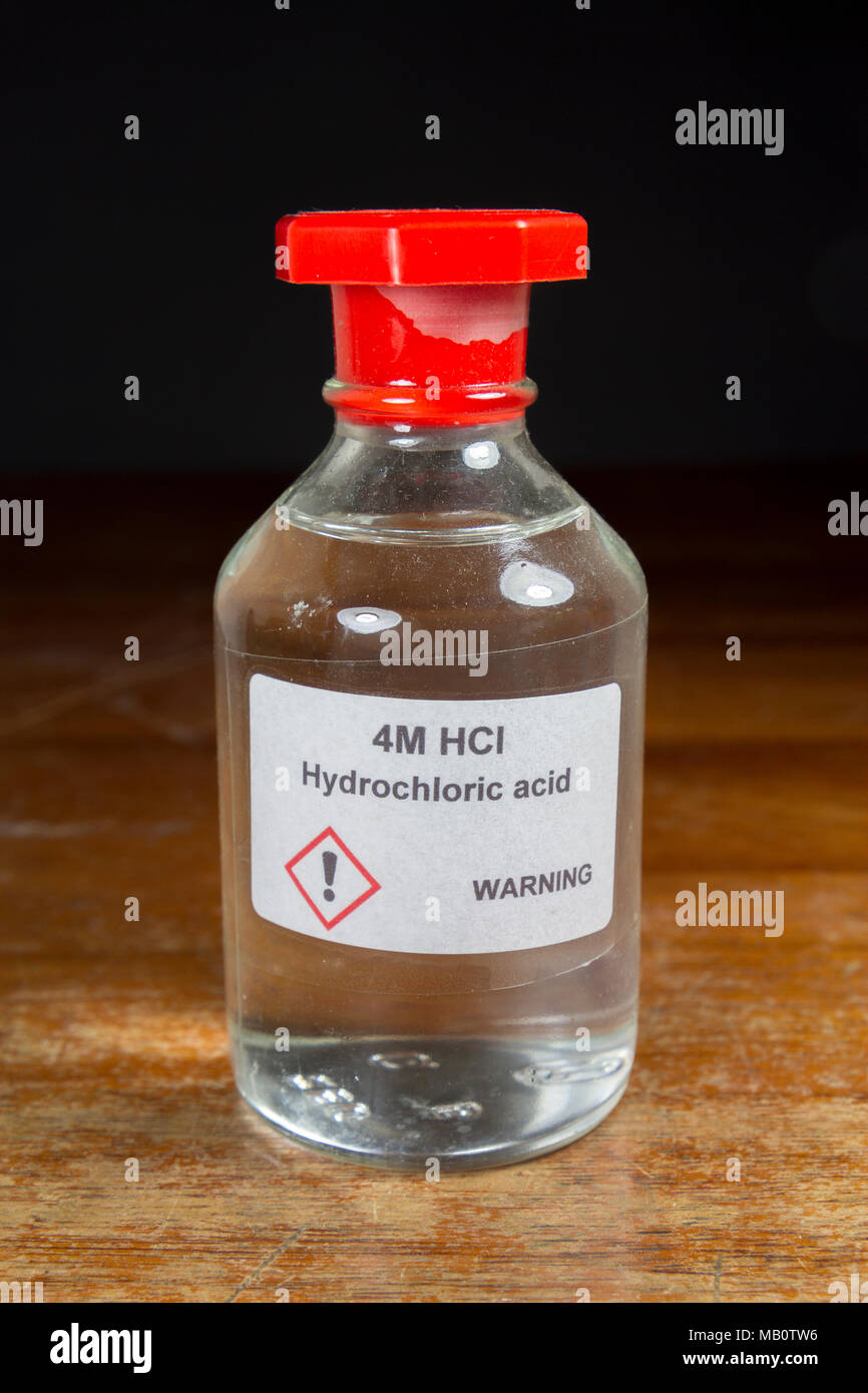 A bottle of 4M hydrochloric acid (HCl) as used in a UK secondary school, London, UK. Stock Photo