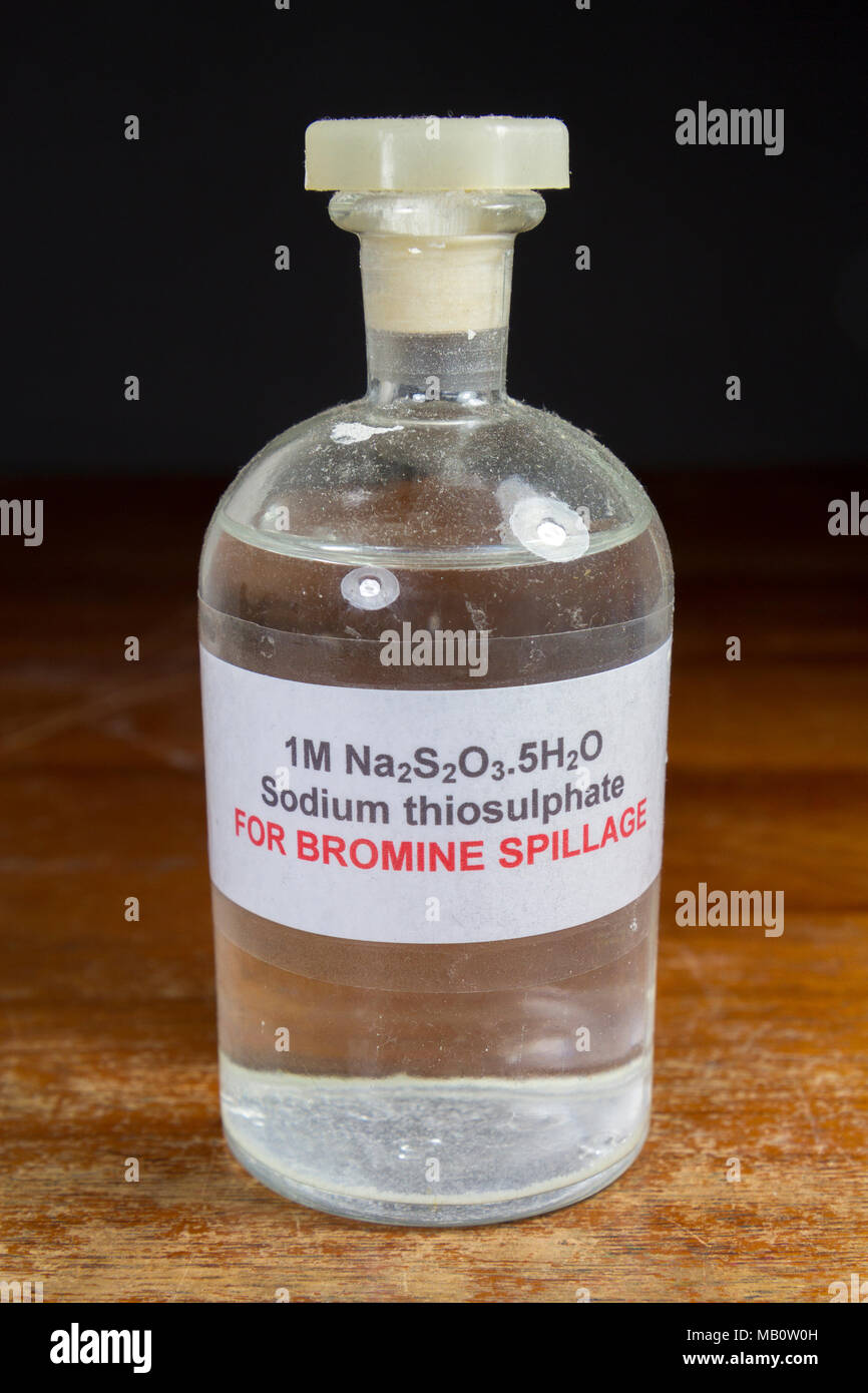A bottle of one molar 1M sodium thiosulphate liquid to be used for bromine spillage, as used in a UK secondary school, London, UK. Stock Photo