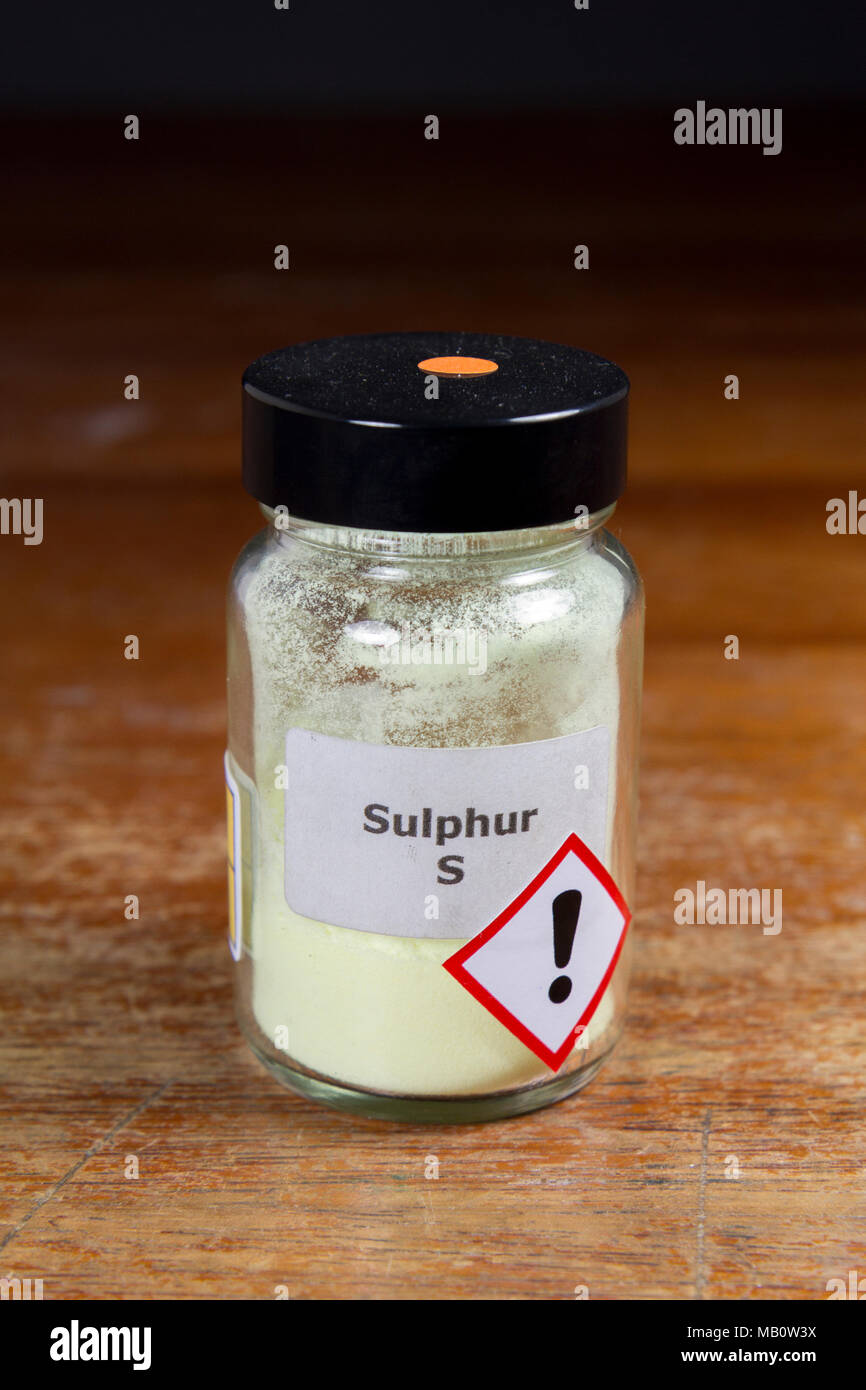 A jar of sulphur powder (S) as used in a UK secondary school, London, UK. Stock Photo