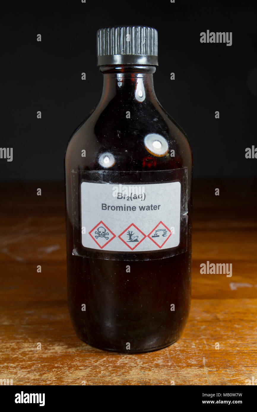 A bottle of bromine water (Br2(Aq)) as used in a UK secondary school, London, UK. Stock Photo