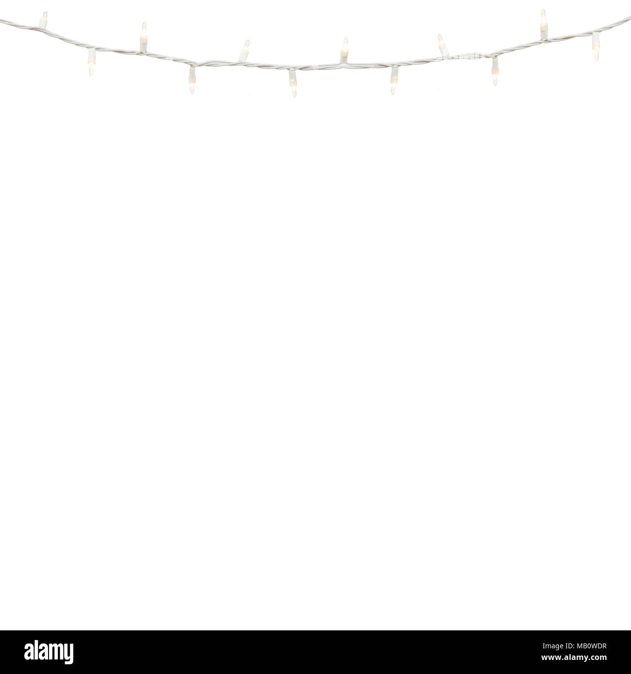 Plain white background with copy space and white string lights at the top for holiday decorations Stock Photo