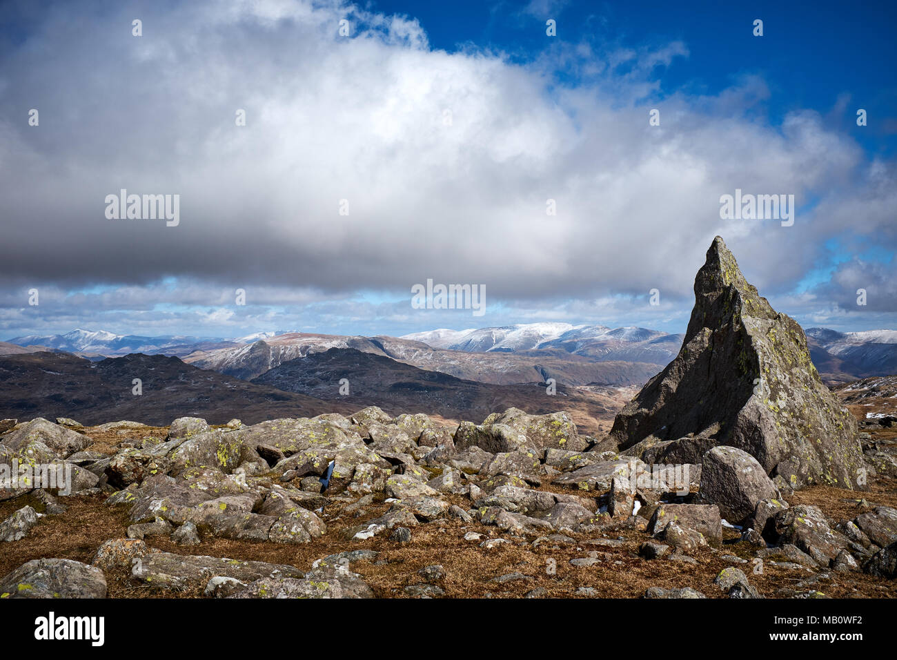 Cumbria / UK - April 5th 2018: The English Lake District where Skiddaw and Helvellyn can be seen from Matterhorn rock on Grey Friar Stock Photo