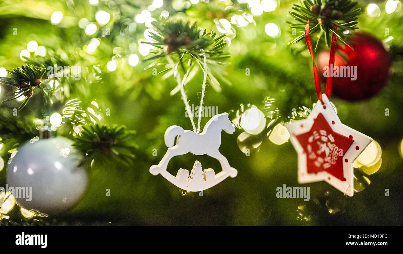 Christmas Tree Decorations Wooden Horse And Christmas Star Stock Photo Alamy