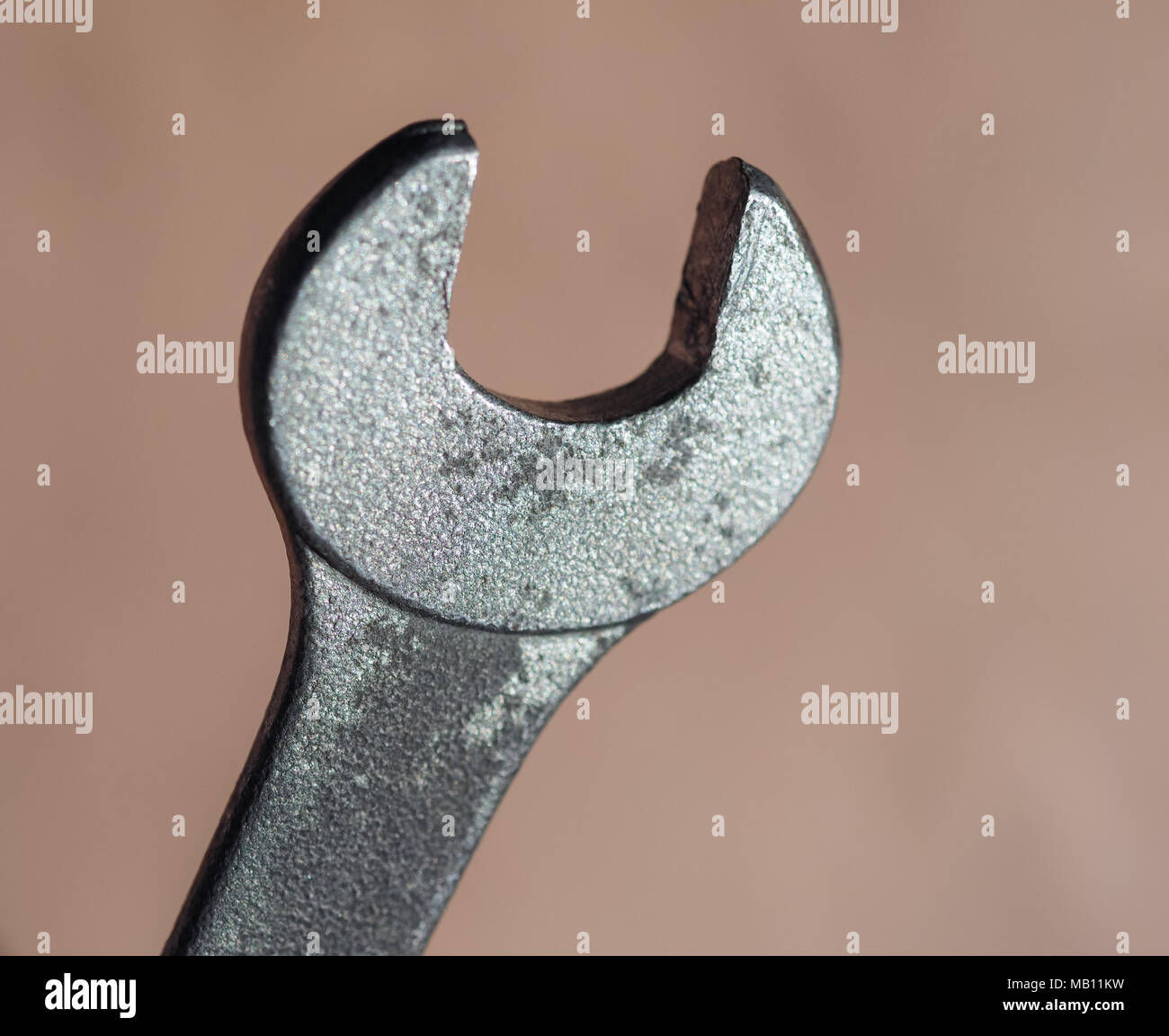 wrench aka spanner tool used to turn rotary fasteners such as nuts and
