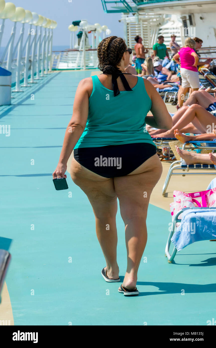 Fat overweight obese female on a cruise ship Stock Photo