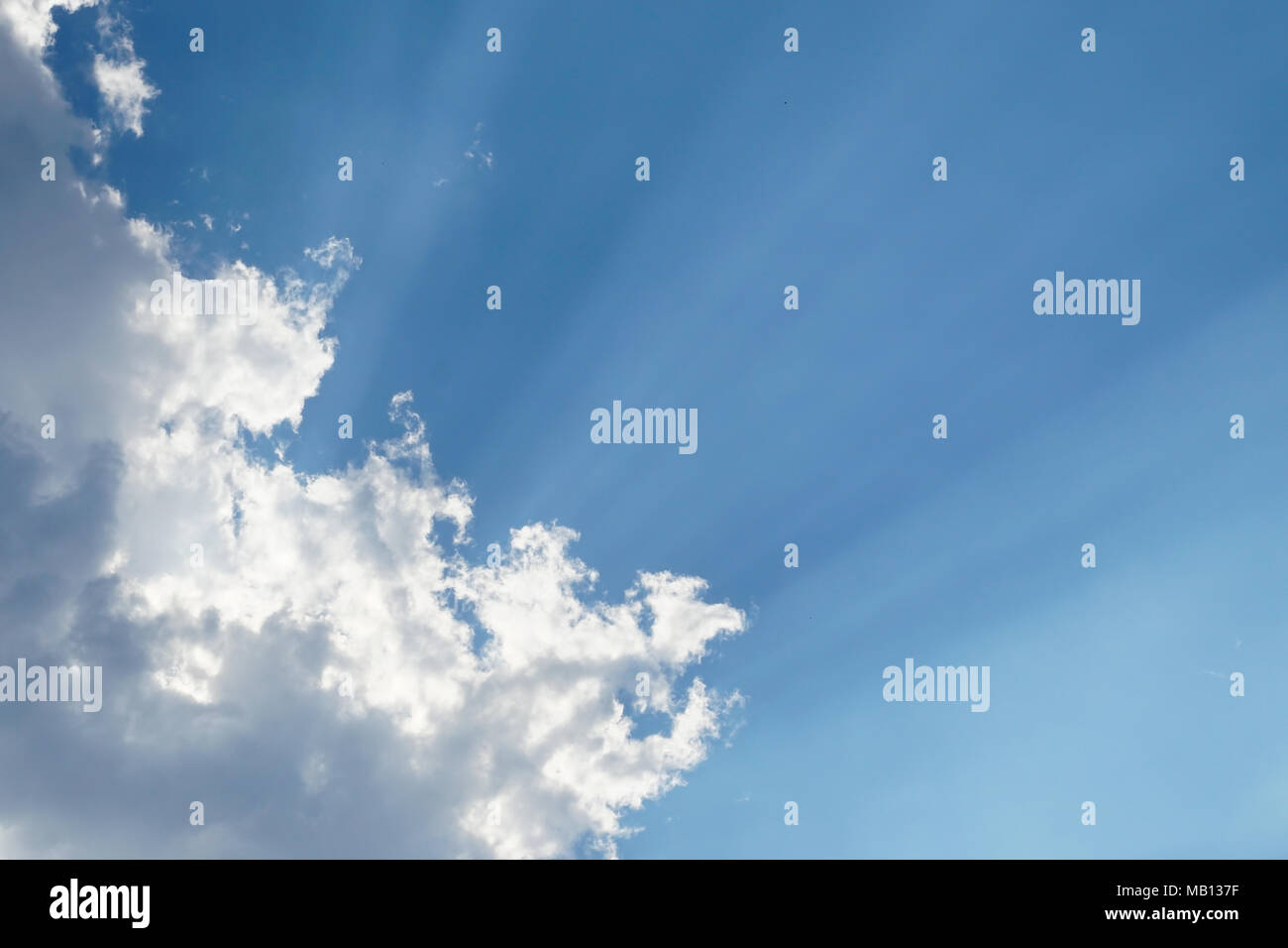 Blue sky with sunlight shining through the cloud Stock Photo - Alamy