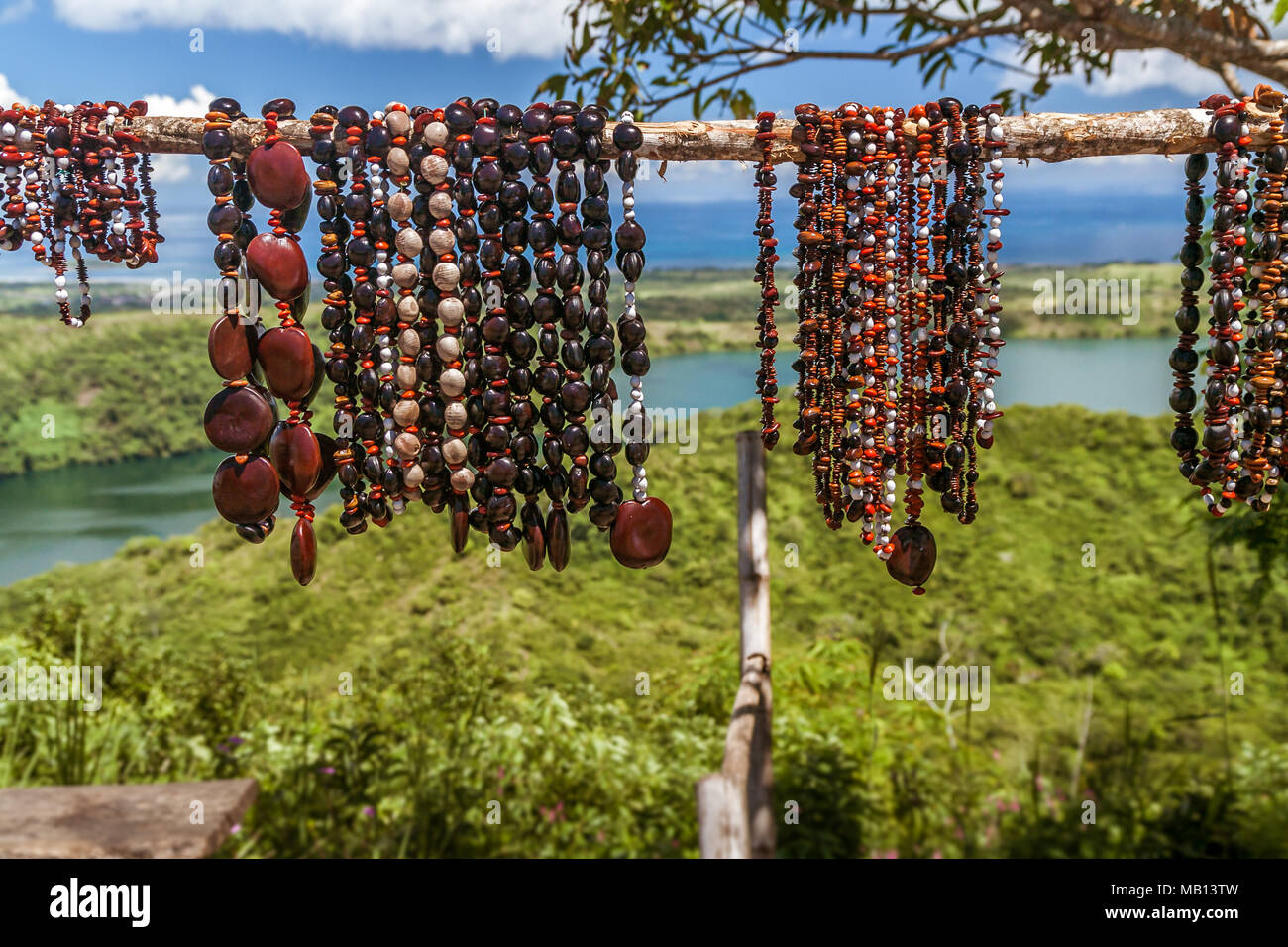 Selling necklaces of seeds in Nosy Be island, northern Madagascar Stock Photo