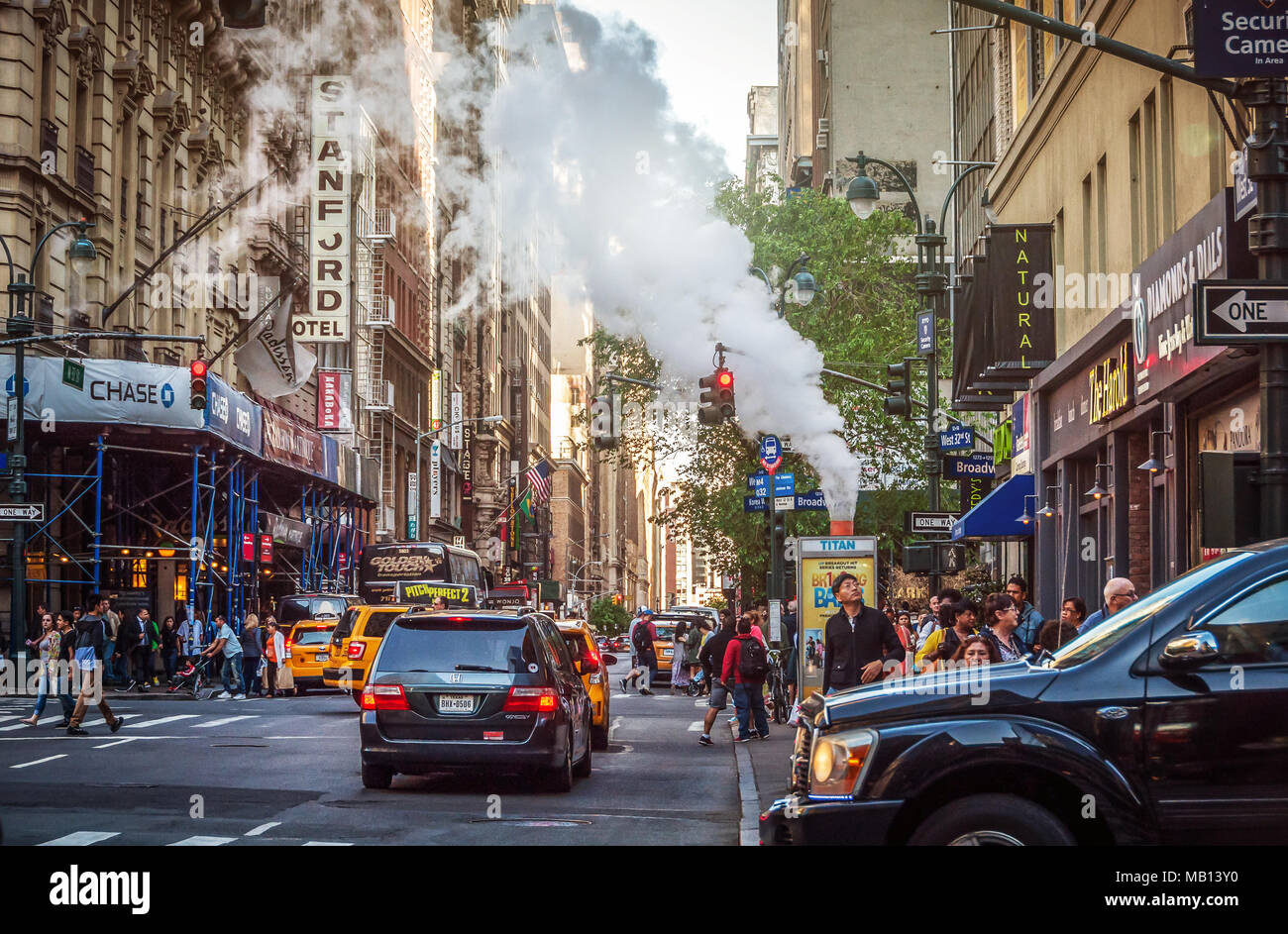 23 May 2015 - New York, USA. People are constantly rushing in a busy and air polluted environment. Stock Photo