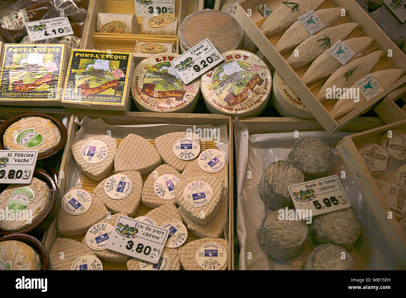 Cheese counter in the covered market Les Halles, Narbonne, Aude, Occitanie, France Stock Photo