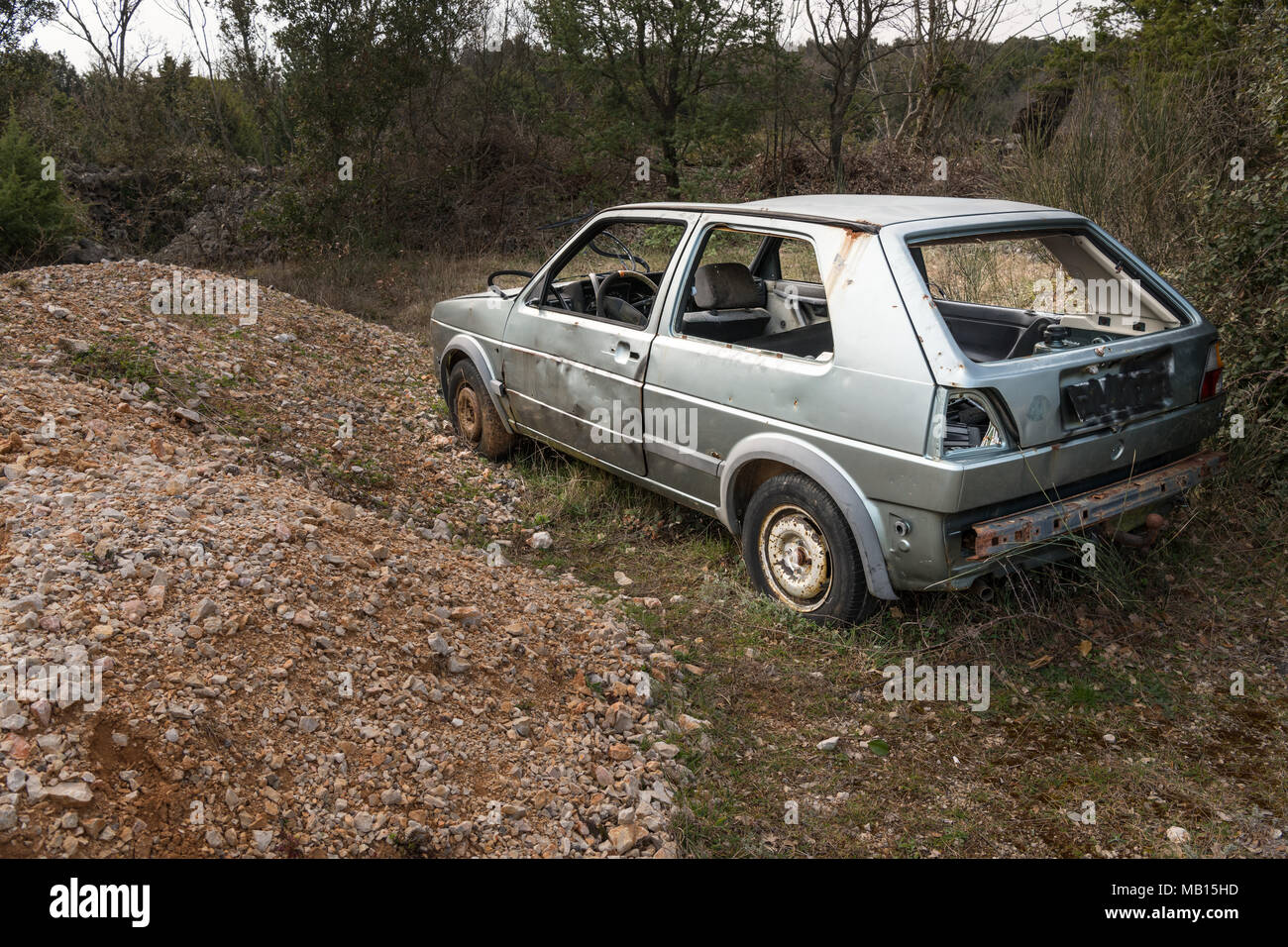 Pollution dumped abandoned old car hi-res stock photography and images ...