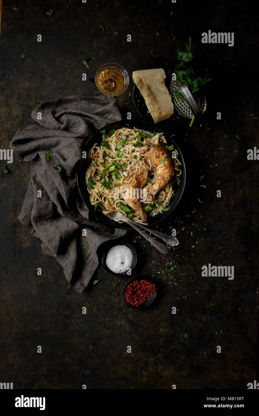 Spaghetti alla carbonara and Roast chicken Stock Photo Alamy