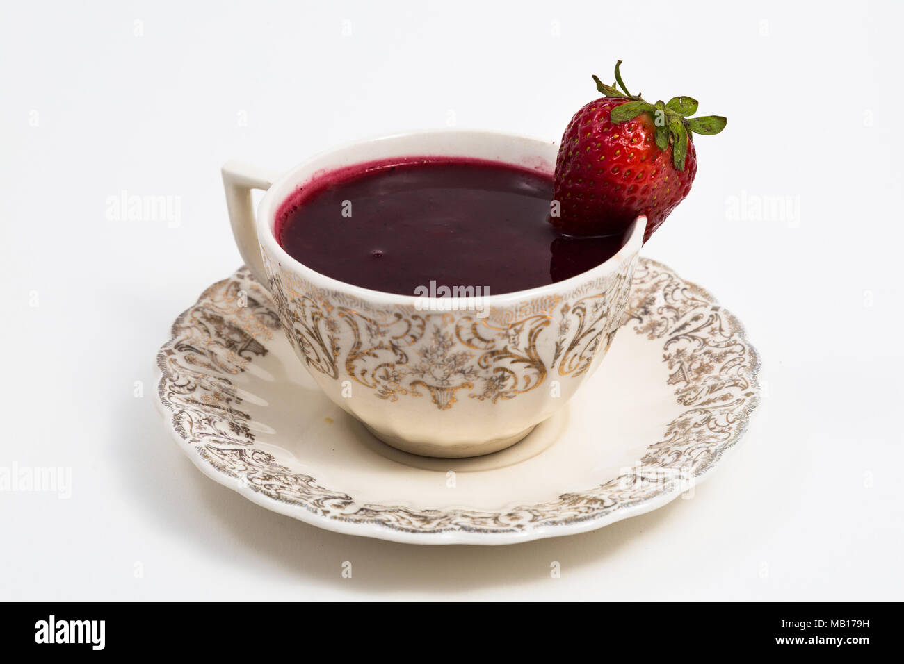 Cup with "Colada Morada" purple wash; traditional Ecuadorian drink