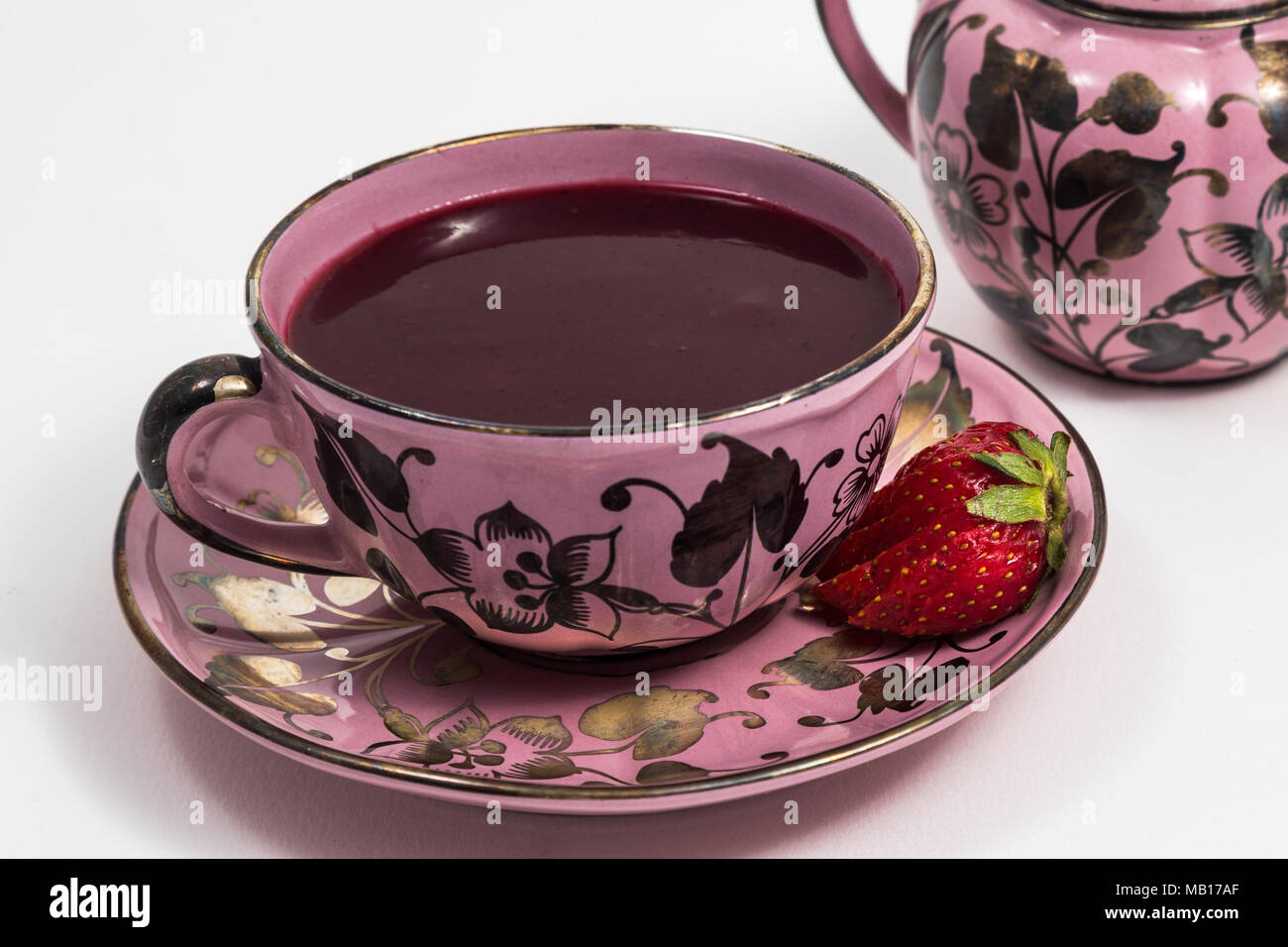 Cup with "Colada Morada" purple wash; traditional Ecuadorian drink