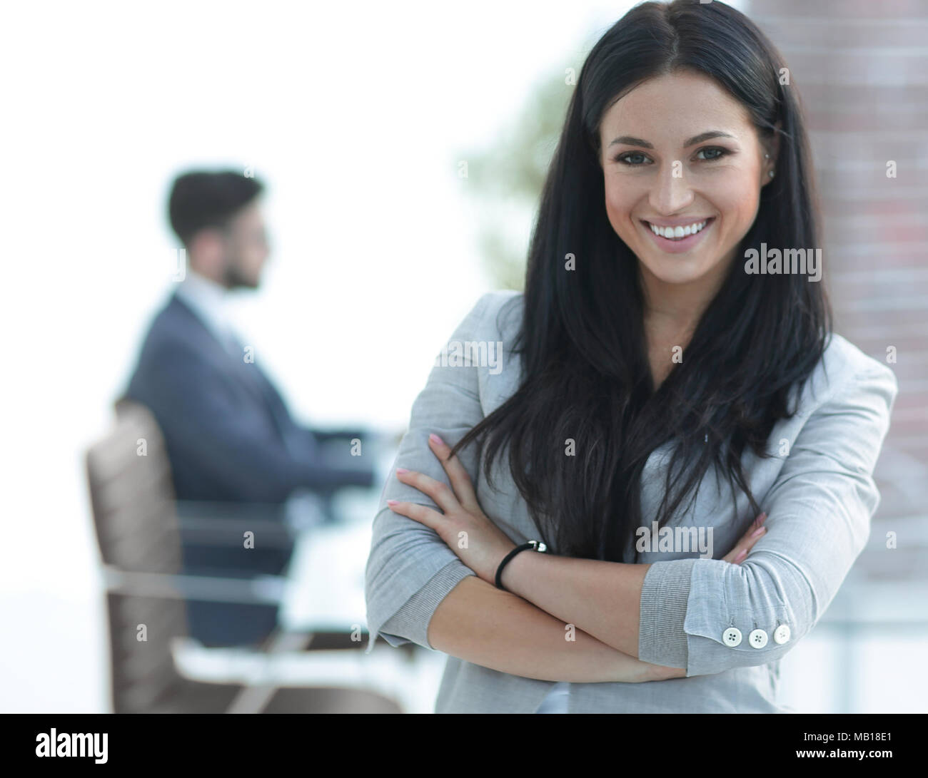 successful young business woman on the office background Stock Photo ...