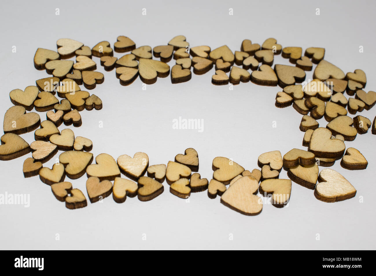 Wooden hearts frame with space for text Stock Photo - Alamy