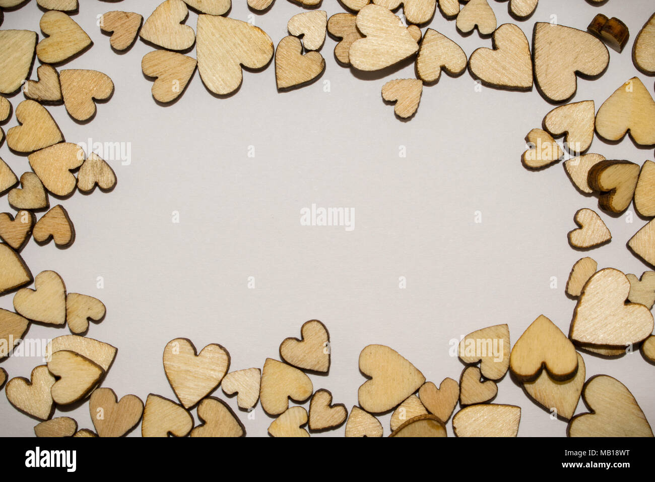 Wooden hearts frame with space for text Stock Photo - Alamy