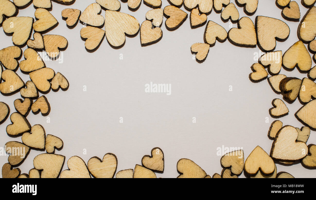 Wooden hearts frame with space for text Stock Photo - Alamy