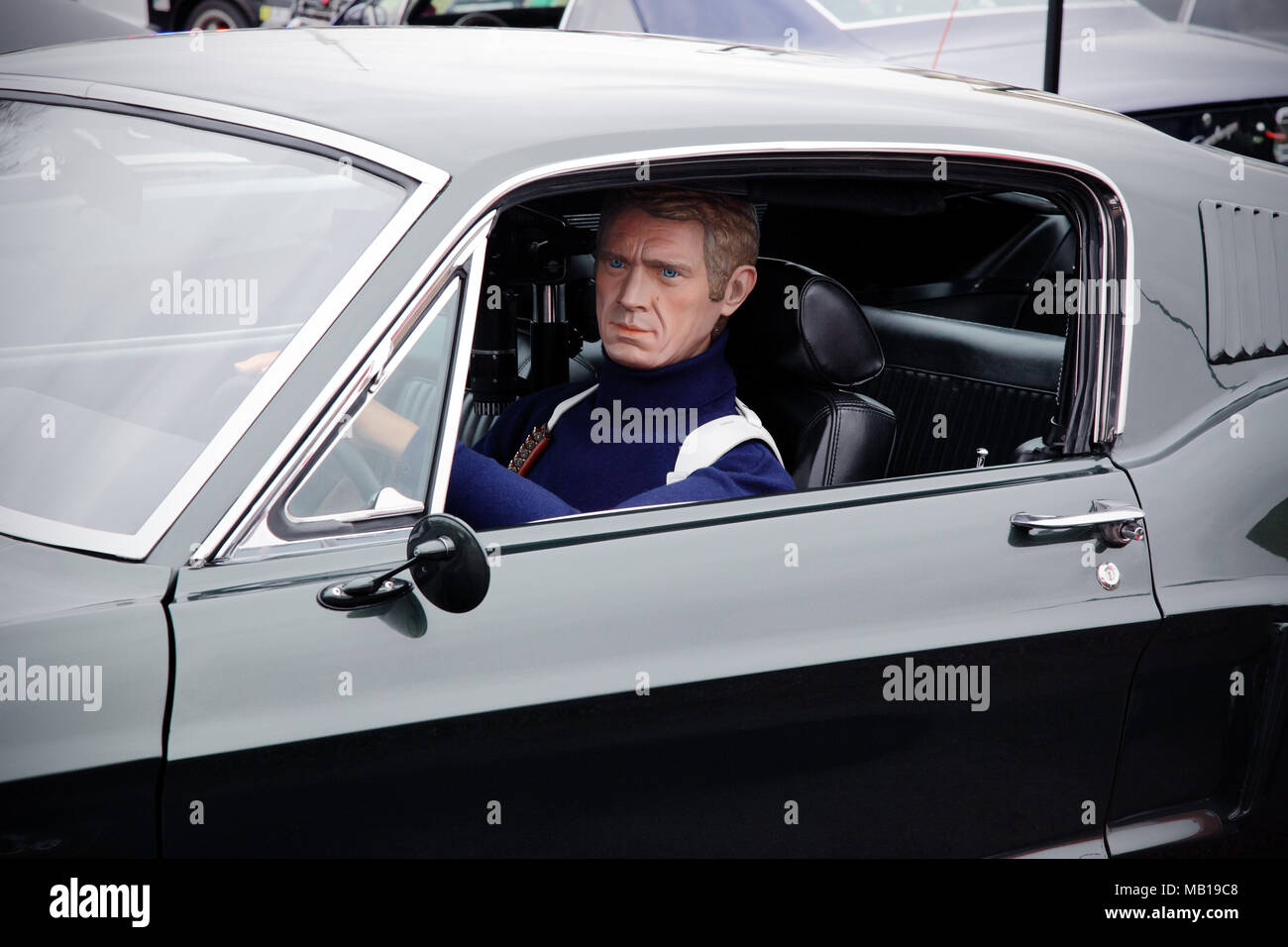 Steve McQueen model or mannequin in a Ford Mustang GT (the Bullitt film car). Stock Photo