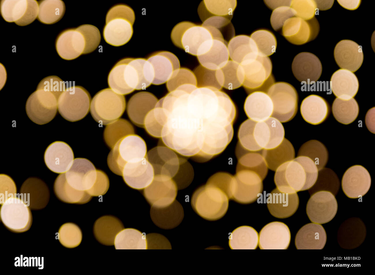 Abstract blurred lights with black background Stock Photo - Alamy
