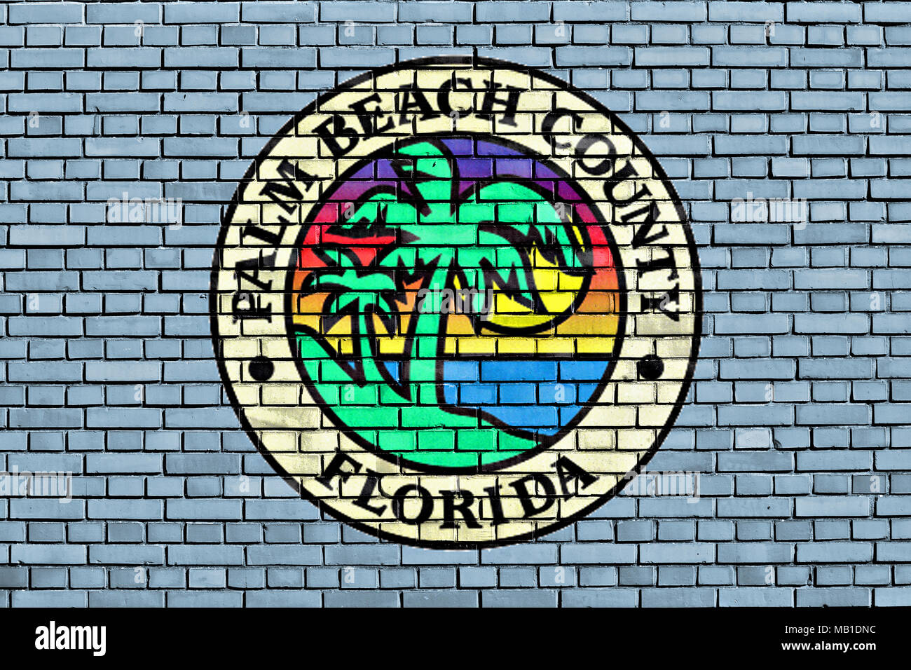 flag of Palm Beach County painted on brick wall Stock Photo