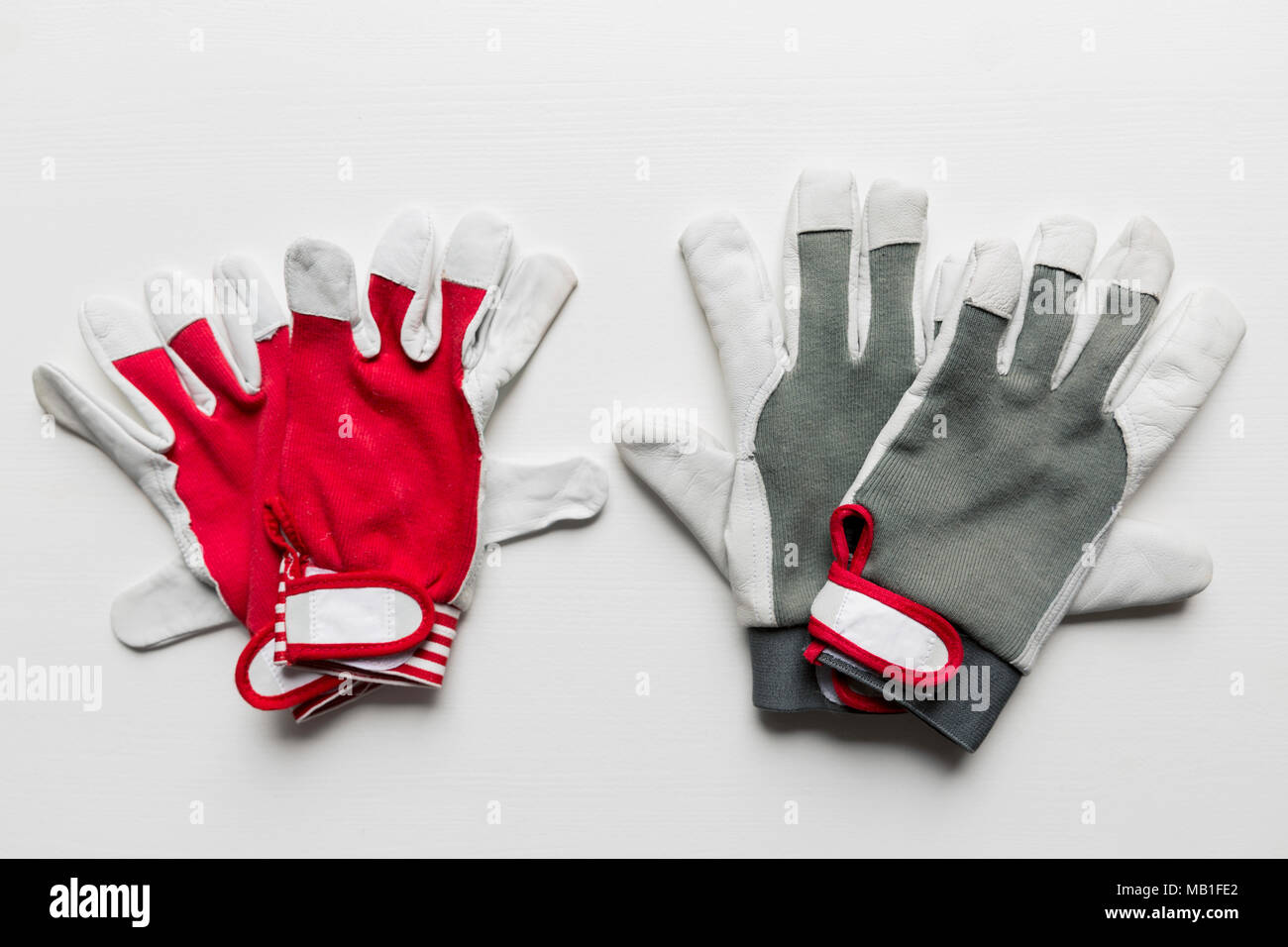Working men's construction gloves isolated on white background Stock Photo