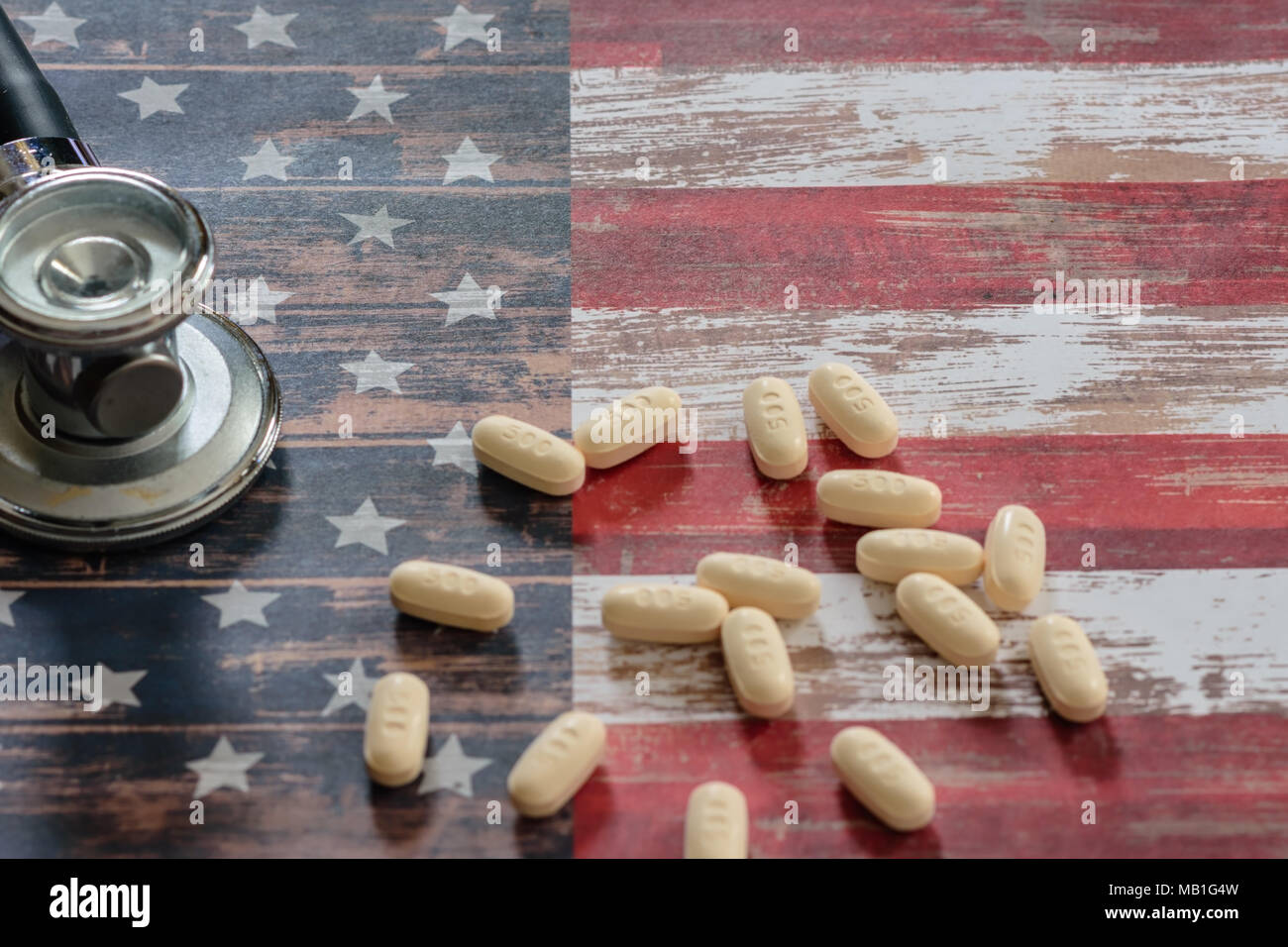 Pain, blood pressure, and heart medication on USA flag for drug usage