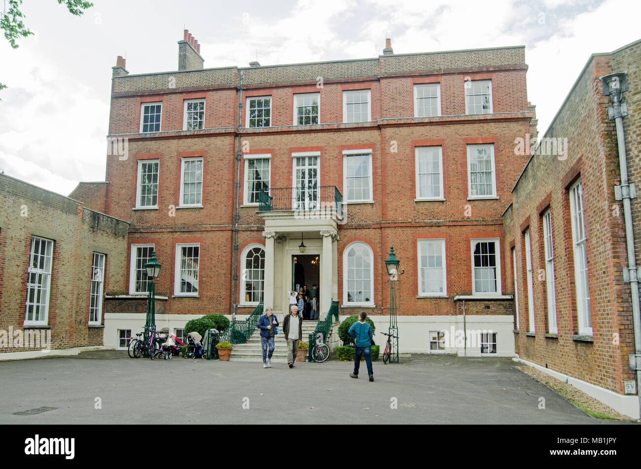 LONDON, UK - SEPTEMBER 17, 2017: Visitors at the entrance to the historic Bushy House, part of the National Physical Laboratory, on an open day in Sep Stock Photo