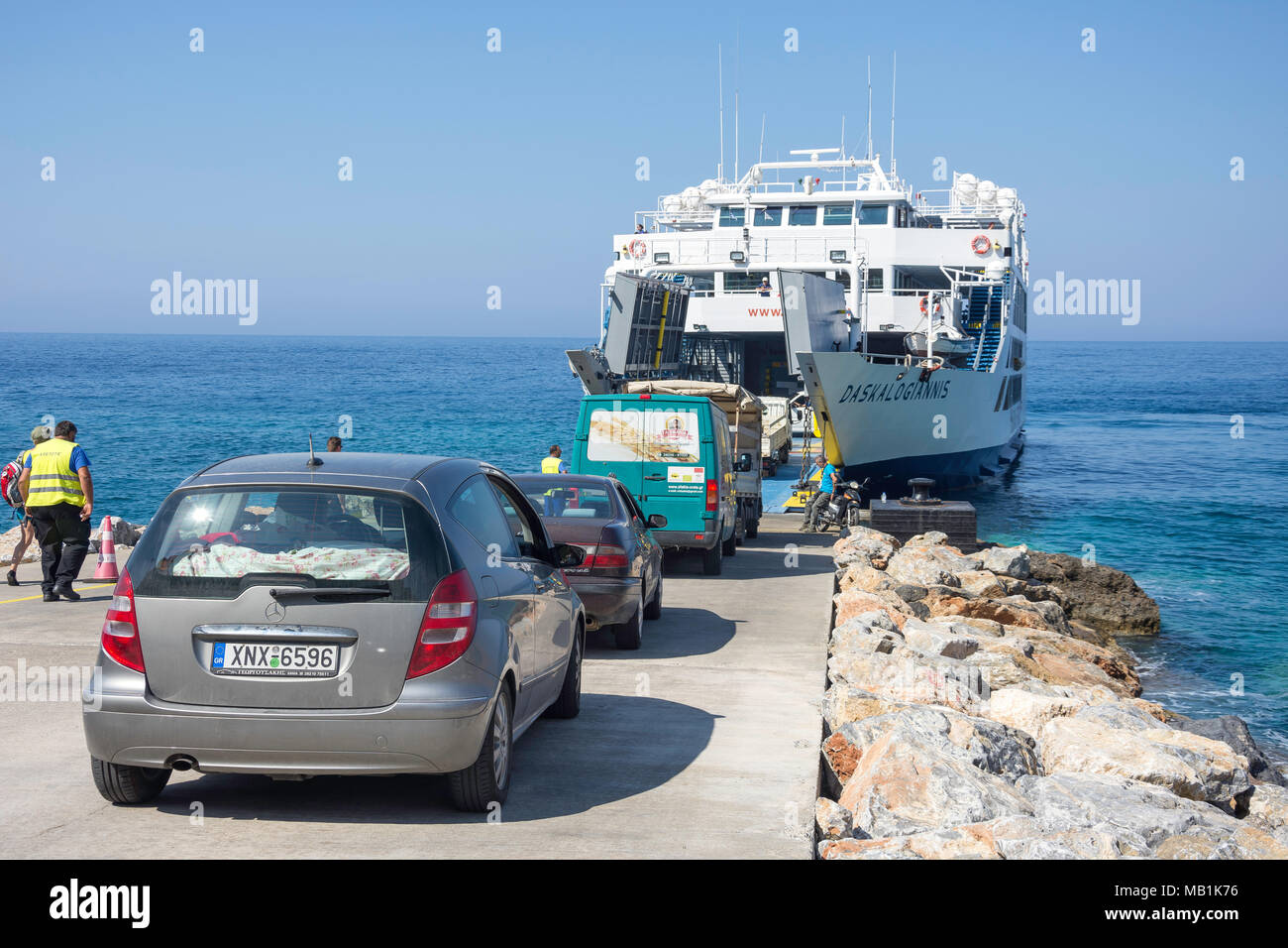 Vehicles boarding the Daskalogiannis ferry boat to Loutro, Hora Sfakion, Sfakia, Chania Region, Crete (Kriti), Greece Stock Photo