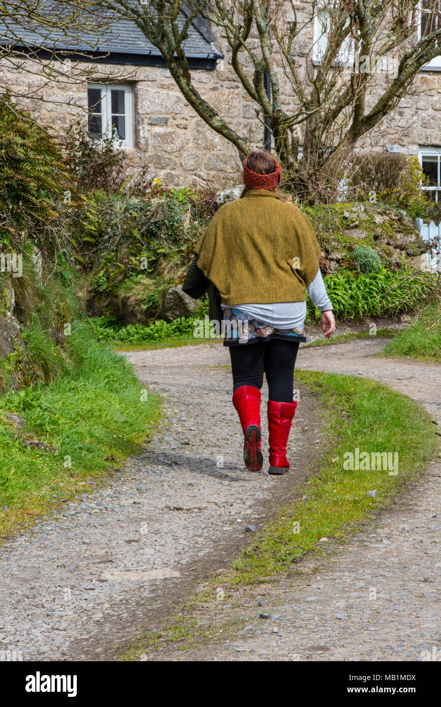 old stone farmhouse wearing red boots 