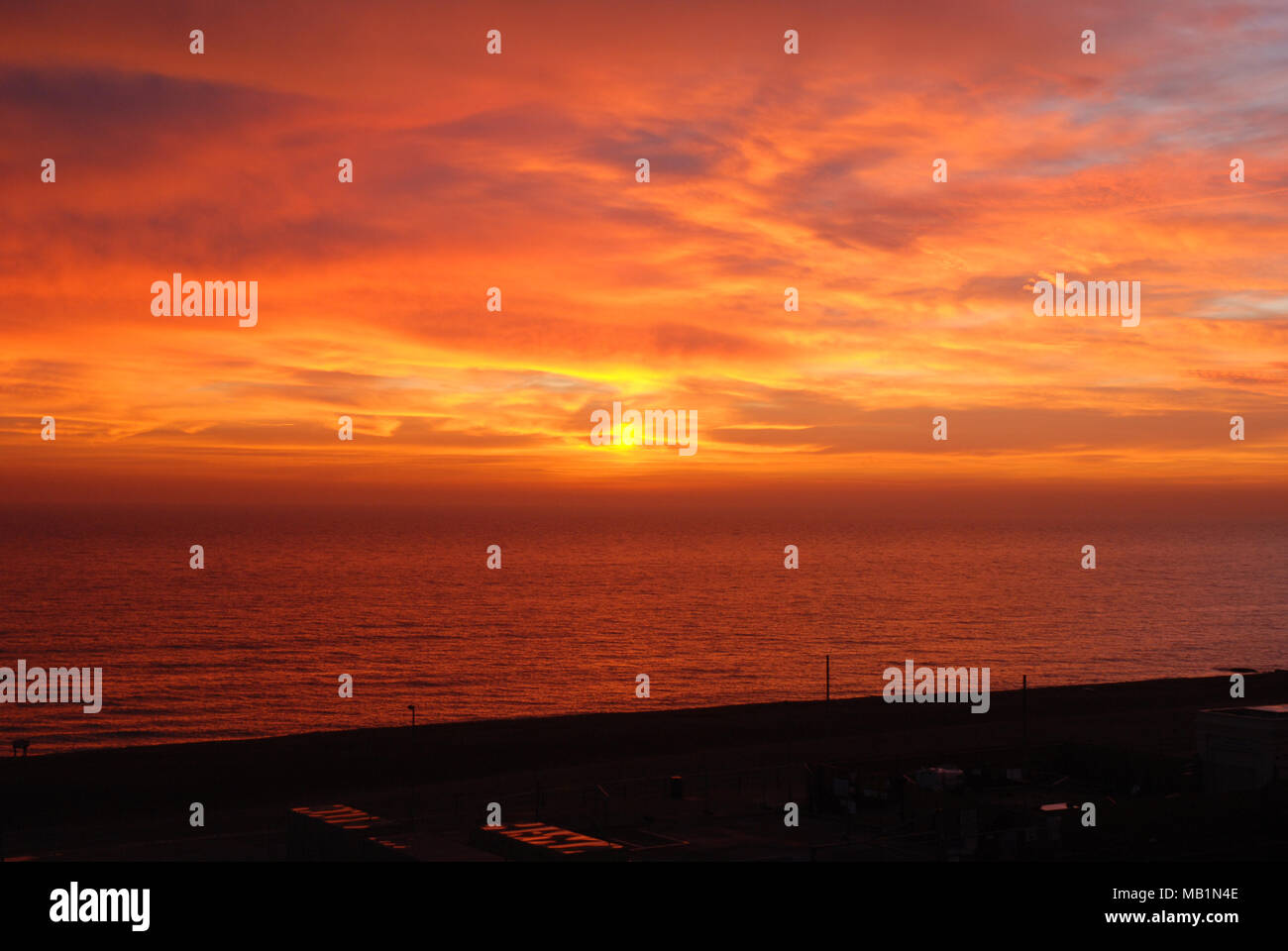 Sun set over looking Black Rock Beach Stock Photo