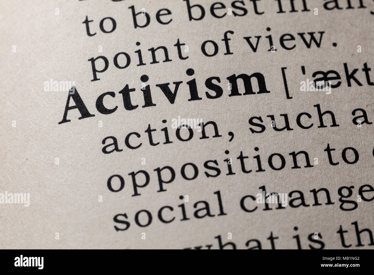 Fake Dictionary, Dictionary definition of the word activism. including key descriptive words. Stock Photo