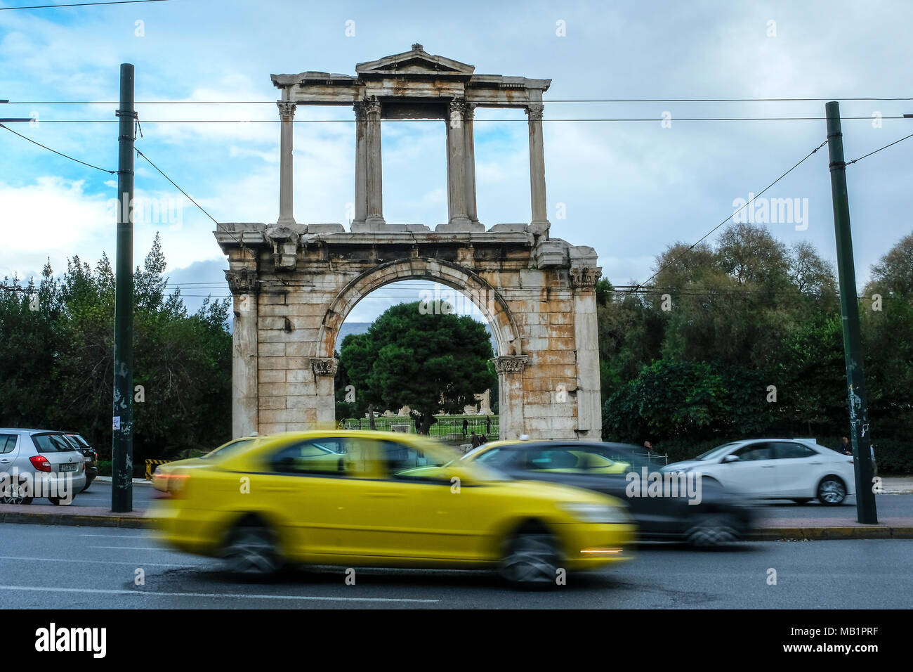 Athens, Greece - December 28, 2017: Cars circulating in front of Hadrian arch in Athens, Greece. Stock Photo
