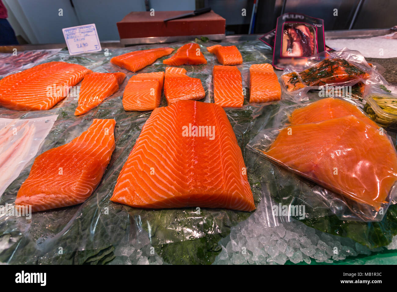 Salmon fillets placed on ice to keep them fresh on the market Stock ...