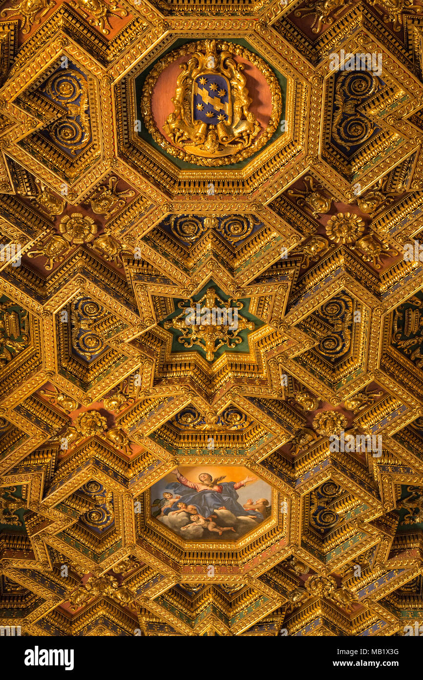 Domenichino's octagonal ceiling painting, Assumption of the Virgin (1617), which fits in the coffered ceiling that he designed for the church Basilica Stock Photo